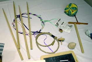 Examples of repro wooden and other toys that were often home-made in the 1860's.